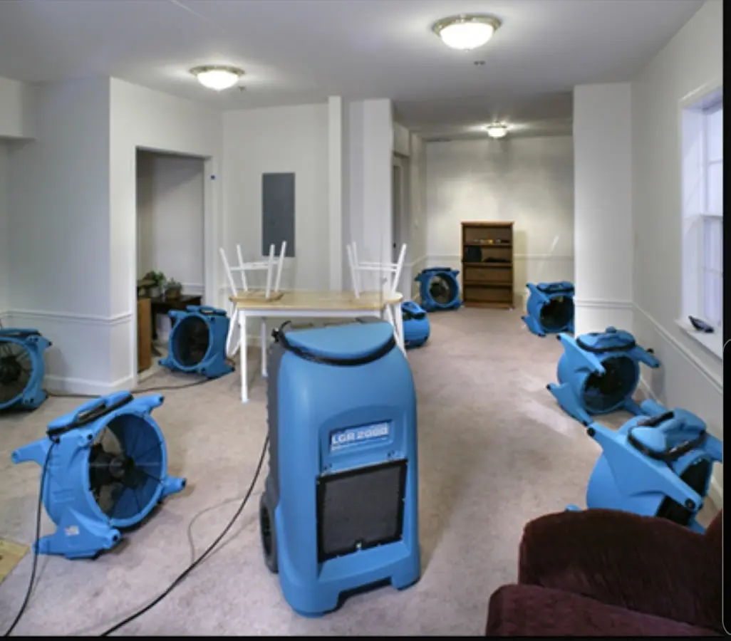 Air movers and dehumidifier setup for Water Damage Restoration in Caribou